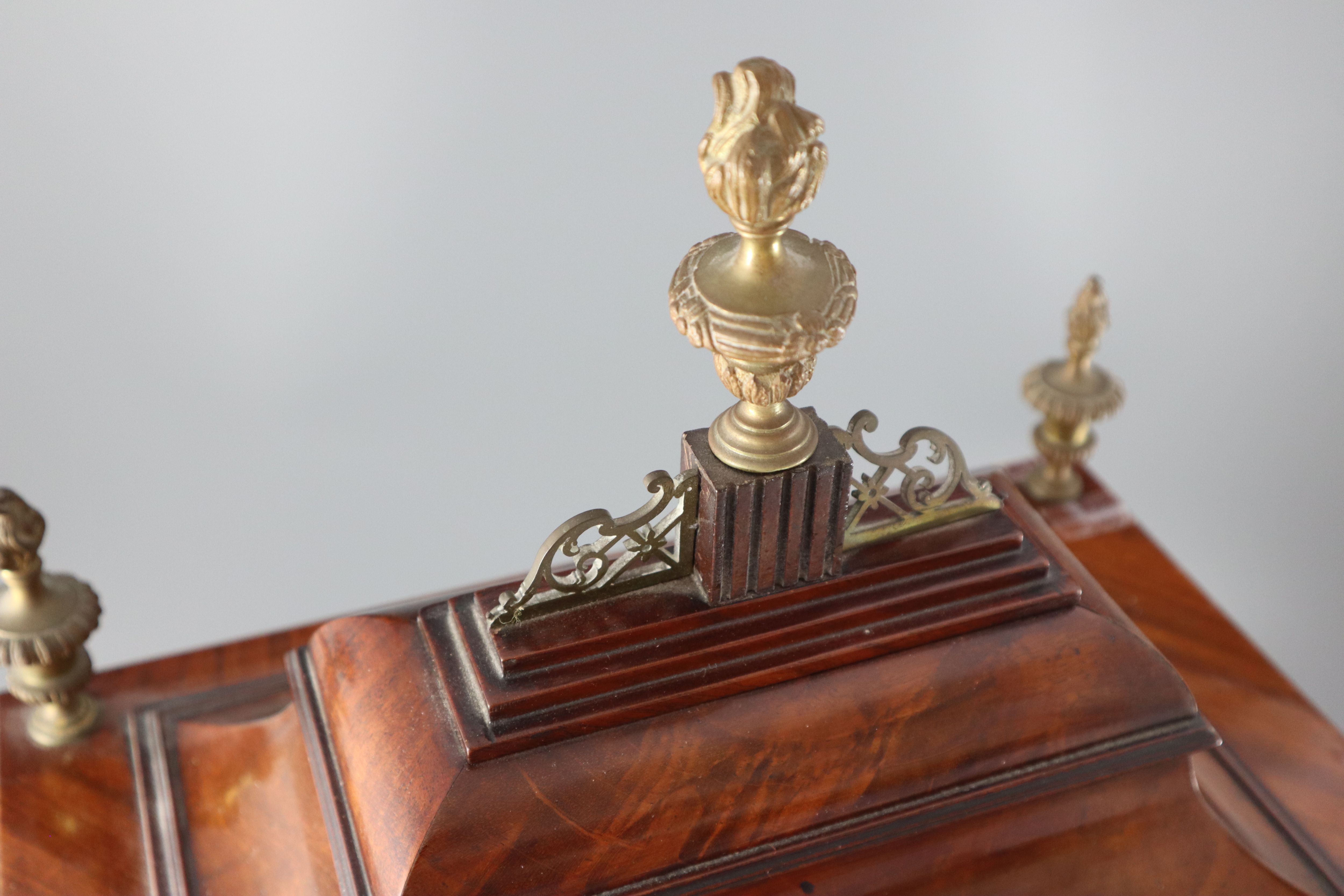 A good George III mahogany musical table clock playing six tunes, John Hovil, Fair Street, London